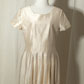 Cream silk pleated dress